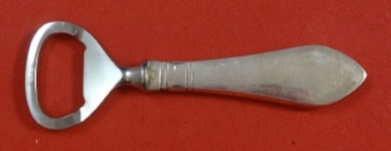 Georg Jensen Continental Sterling Silver Bottle Opener 4.5 inches: Georg Jensen Continental Sterling Silver Bottle Opener 4.5 inches This exquisite bottle opener is a remarkable piece from the Continental pattern by Georg Jensen, crafted in sterling silver. Measuring