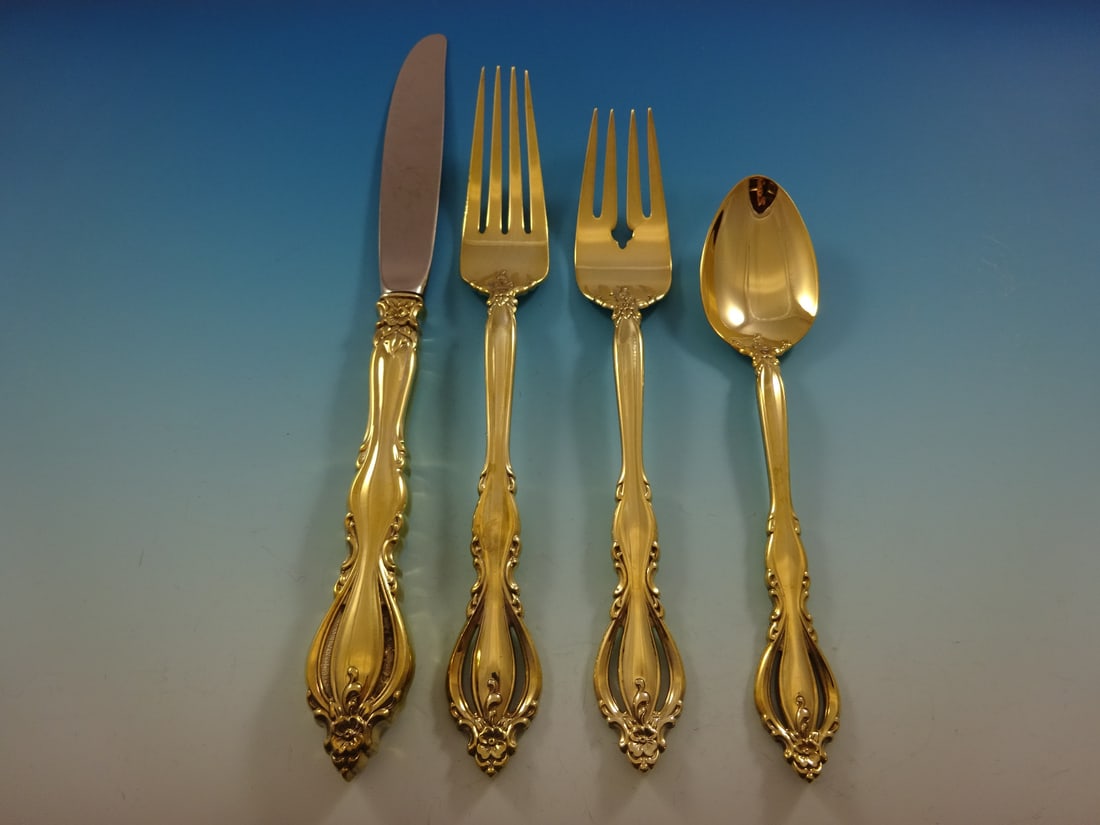 Grand Regency International Sterling Silver Flatware Set for 8 with Gold Finish: Grand Regency International Sterling Silver Flatware Set for 8 with Gold Finish This exquisite Grand Regency flatware set by International Sterling is a stunning addition to any dining experience. Cra