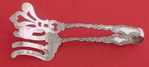 Durgin Watteau Sterling Silver Asparagus Serving Tong 9.5 Inches: Durgin Watteau Sterling Silver Asparagus Serving Tong 9.5 Inches This exquisite asparagus serving tong is crafted from sterling silver and features the elegant Watteau pattern by Durgin. Measuring 9 1