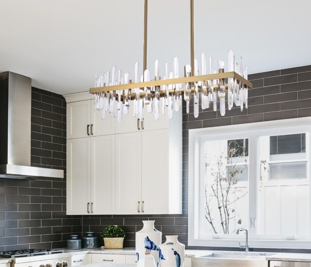 Serena 20-Light Satin Gold Crystal Chandelier 36 Inch Modern Ceiling Fixture: Serena 20-Light Satin Gold Crystal Chandelier 36 Inch Modern Ceiling Fixture This modern satin gold chandelier features a rectangular design with 20 lights and high-quality crystal accents. The chande