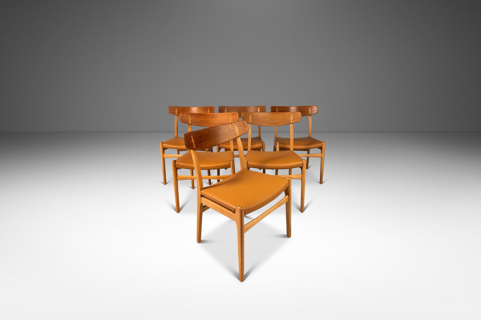 Set of 6 Hans Wegner CH23 Dining Chairs Oak Teak Italian Leather Denmark 1950s: Set of 6 Hans Wegner CH23 Dining Chairs Oak Teak Italian Leather Denmark 1950s Introducing a rare and expansive set of six early Model CH 23 dining chairs designed by Hans J. Wegner for Carl Hansen &