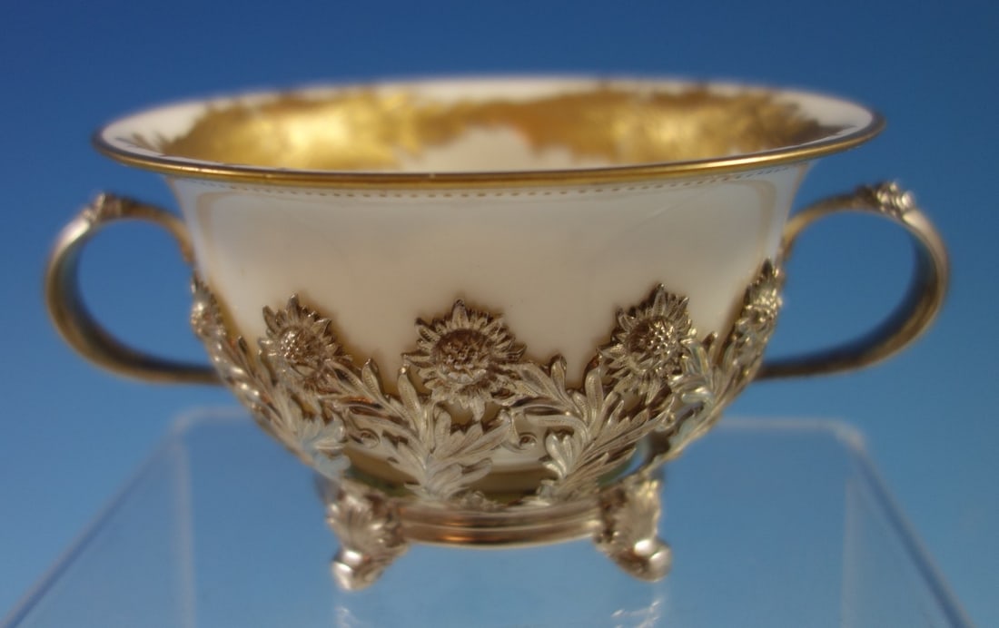 Tiffany & Co Chrysanthemum Sterling Silver Bouillon Cup with Gold Liner: Tiffany & Co Chrysanthemum Sterling Silver Bouillon Cup with Gold Liner Discover the elegance of this exquisite Chrysanthemum bouillon cup by Tiffany & Co. Crafted from fine sterling silver and featur