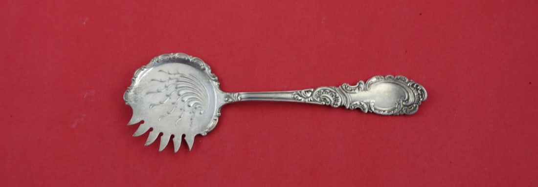 Wallace Louvre Sterling Silver Cucumber Server 5 3/4": Wallace Louvre Sterling Silver Cucumber Server 5 3/4" This exquisite cucumber server is part of the Louvre pattern by Wallace, crafted from high-quality sterling silver. Measuring 5 3/4" in length, th