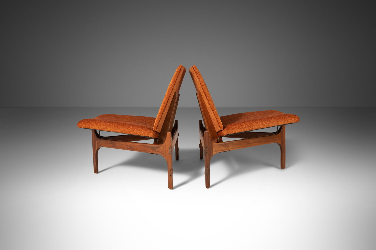 John Keal Mid-Century Modern Walnut Lounge Chairs Set of 2: John Keal Mid-Century Modern Walnut Lounge Chairs Set of 2 This ultra-rare set of two triangular low profile lounge chairs, designed by John Keal for Brown Saltman in the 1950s, showcases exquisite cr