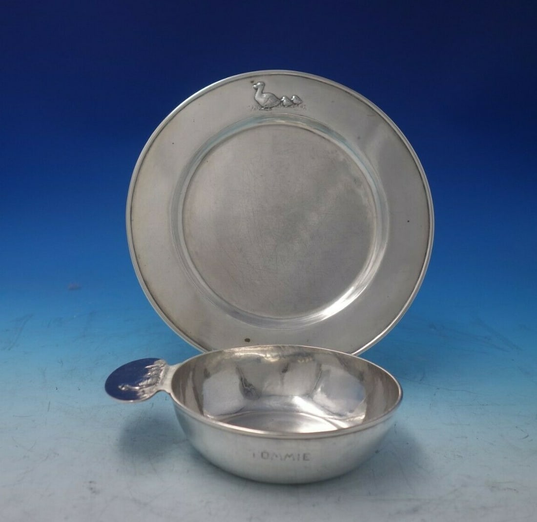 Kalo Sterling Silver 2pc Child's Porringer Plate Set with Duck Motif: Kalo Sterling Silver 2pc Child's Porringer Plate Set with Duck Motif This charming Kalo sterling silver handwrought two-piece child's set features an adorable duck and chicks motif. The set includes a