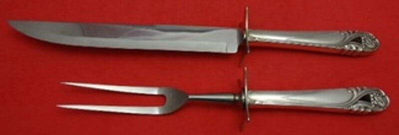 International Spring Glory Sterling Silver 2pc Carving Set: International Spring Glory Sterling Silver 2pc Carving Set Experience the elegance of the Spring Glory carving set by International, expertly crafted in sterling silver. This stunning two-piece roast