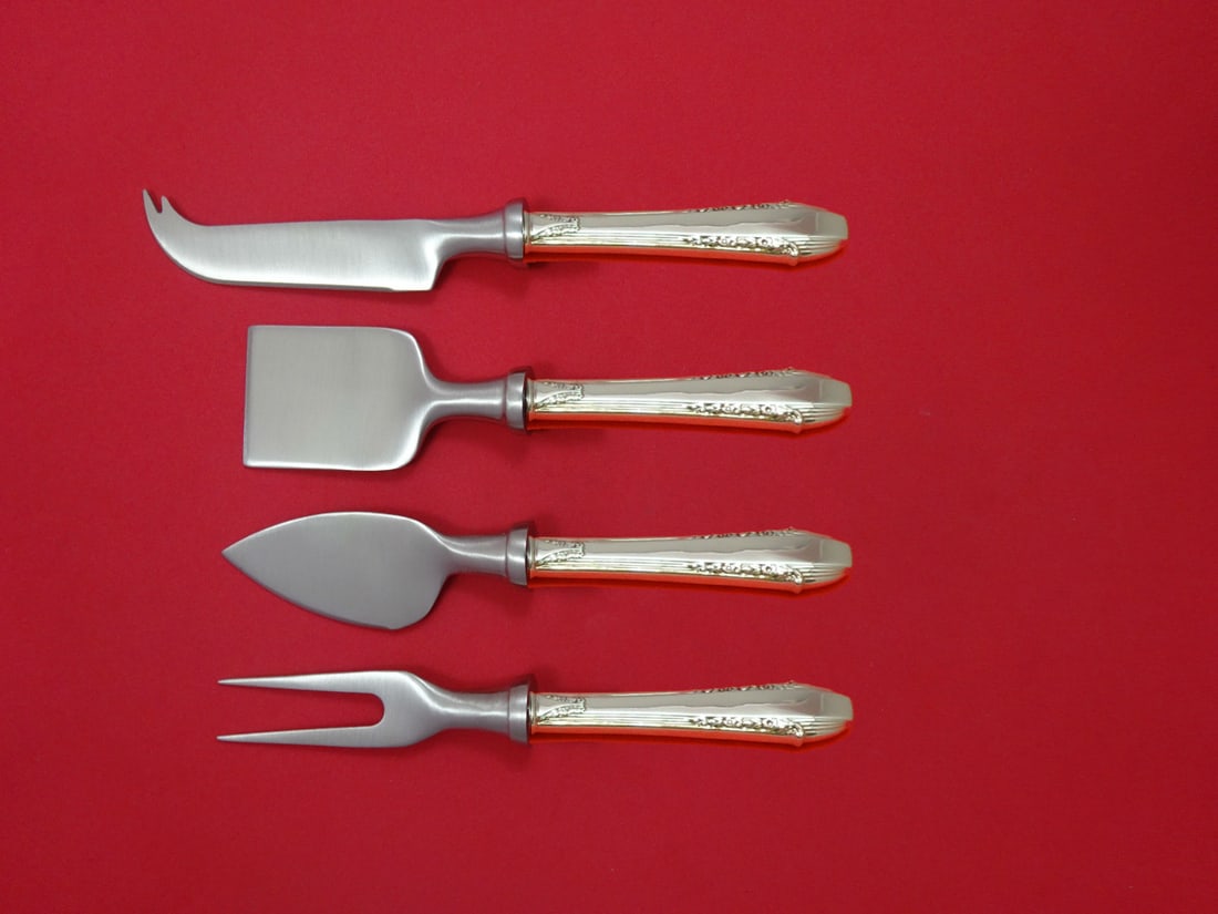Enchantress 4pc Sterling Silver Cheese Serving Set by International: Enchantress 4pc Sterling Silver Cheese Serving Set by International This exquisite 4-piece cheese serving set from the Enchantress pattern by International Sterling is a must-have for any hostess. Cra
