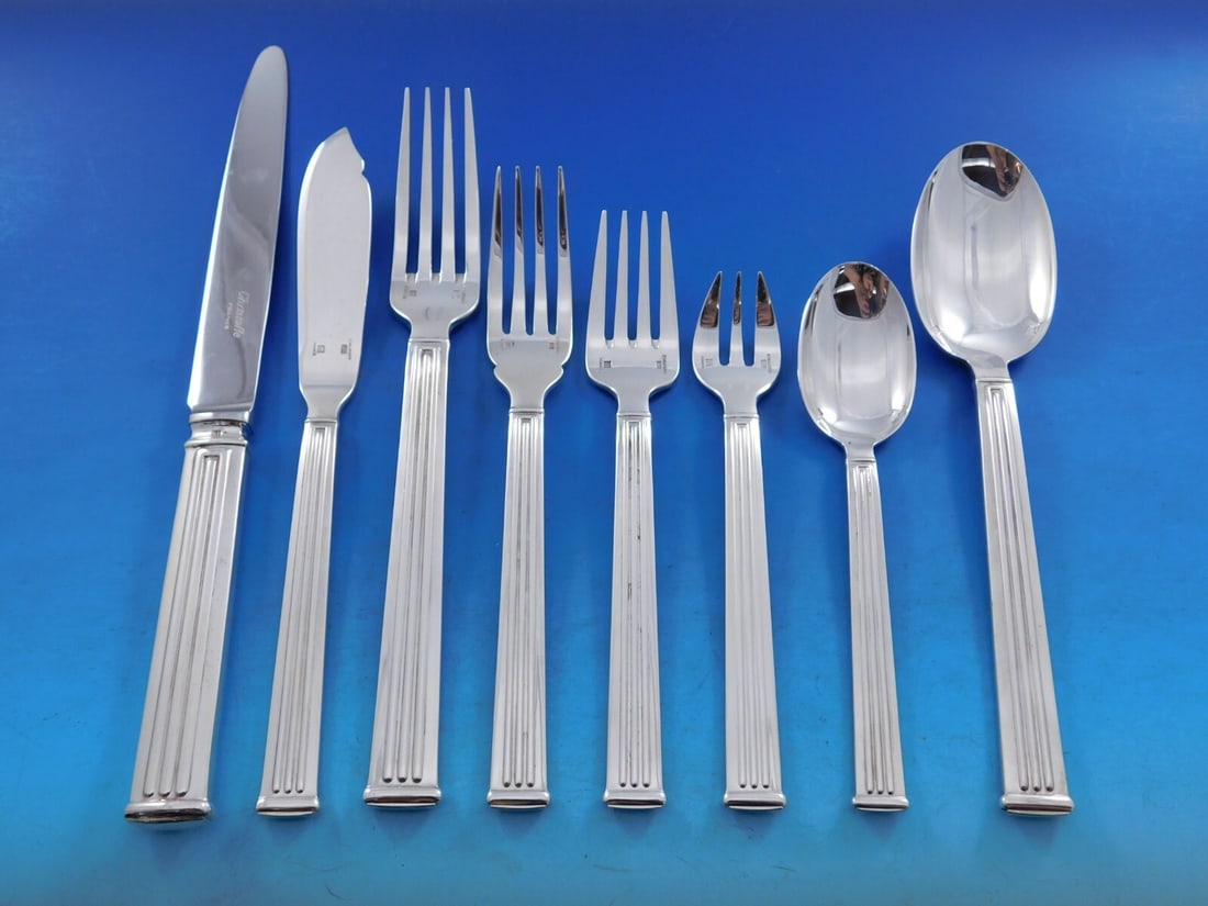 Christofle Triade Silverplated Flatware Set 96 Pieces for 12: Christofle Triade Silverplated Flatware Set 96 Pieces for 12 Enhance your dining experience with this exquisite Triade flatware set by Christofle, crafted in France. This stunning 96-piece set feature