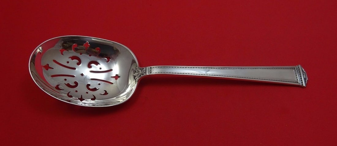 International Sterling Silver Pantheon 9 Ice Spoon Serving Utensil: International Sterling Silver Pantheon 9 Ice Spoon Serving Utensil This exquisite 9" ice spoon features the Pantheon pattern by International Sterling, crafted from high-quality sterling silver. The d