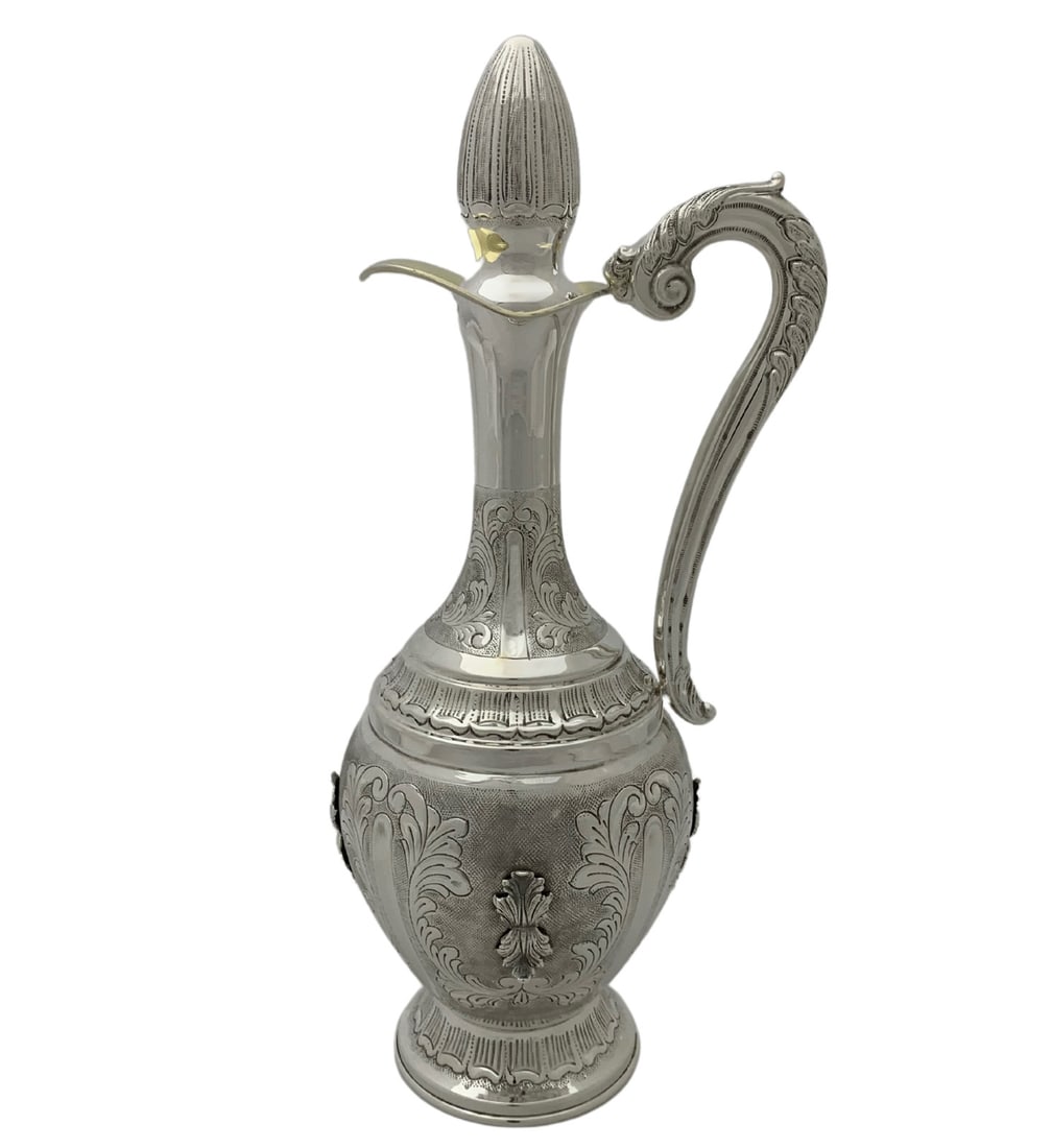 Handmade 925 Sterling Silver Fluted Wine Bottle with Leaf Design: Handmade 925 Sterling Silver Fluted Wine Bottle with Leaf Design This exquisite wine bottle is crafted from fine 925 sterling silver, showcasing a stunning handmade chased swirl leaf applique design a