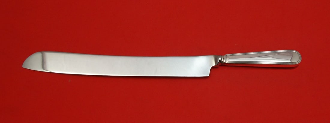 Tiffany & Co. Hamilton Sterling Silver Wedding Cake Knife 12": Tiffany & Co. Hamilton Sterling Silver Wedding Cake Knife 12" Presenting a custom-made wedding cake knife from the renowned Hamilton pattern by Tiffany & Co. This exquisite piece features a sterling s