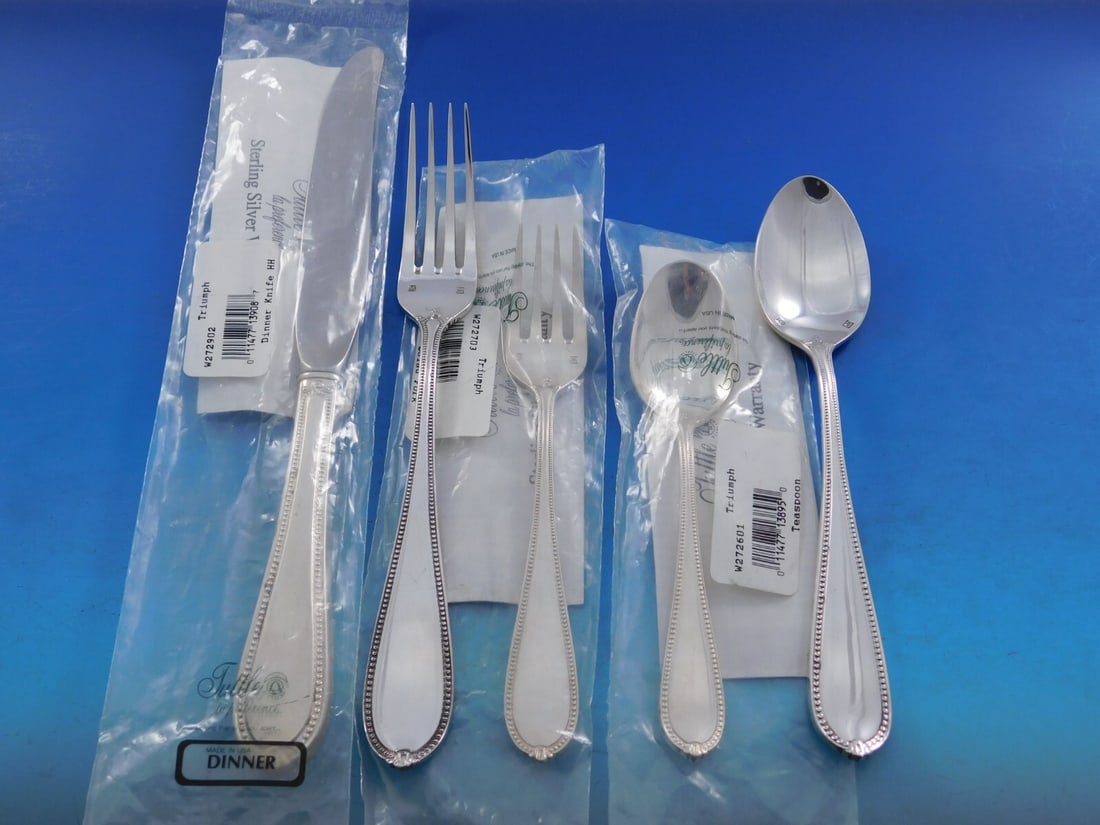 Triumph by Tuttle Sterling Silver Flatware Set 42 Pieces Service for 8: Triumph by Tuttle Sterling Silver Flatware Set 42 Pieces Service for 8 Elevate your dining experience with the Triumph by Tuttle Sterling Silver Flatware Set, designed to serve 8 guests with elegance