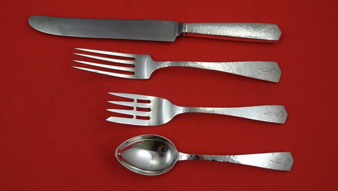 International Colonial Hammered Sterling Silver 4-Pc Place Setting: International Colonial Hammered Sterling Silver 4-Pc Place Setting This exquisite 4-piece place setting from the Colonial Hammered pattern by International Sterling is a splendid addition to any dinin