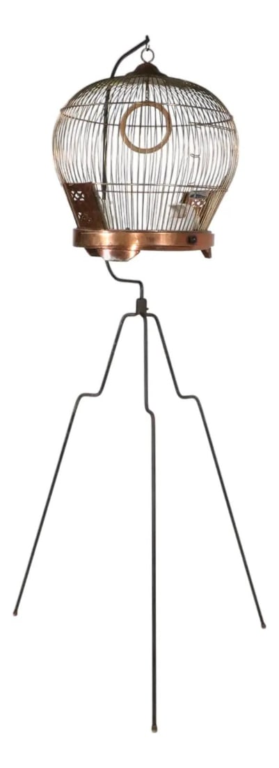 Mid Century Copper Birdcage with Wrought Iron Stand by Reliance: Mid Century Copper Birdcage with Wrought Iron Stand by Reliance This stunning mid 20th-century birdcage features a beautiful copper construction and is complemented by a sturdy wrought iron stand. Inc
