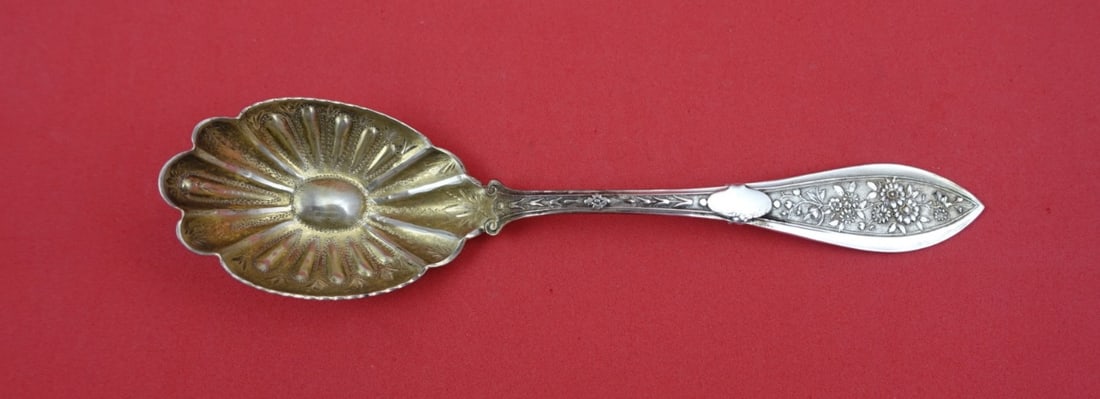 Shiebler Montezuma Sterling Sugar Spoon Gold Wash Brite Cut Floral 6 1/8 Inch: Shiebler Montezuma Sterling Sugar Spoon Gold Wash Brite Cut Floral 6 1/8 Inch This is a Shiebler Montezuma pattern sterling silver sugar spoon featuring a gold-washed, bright-cut flower design in the