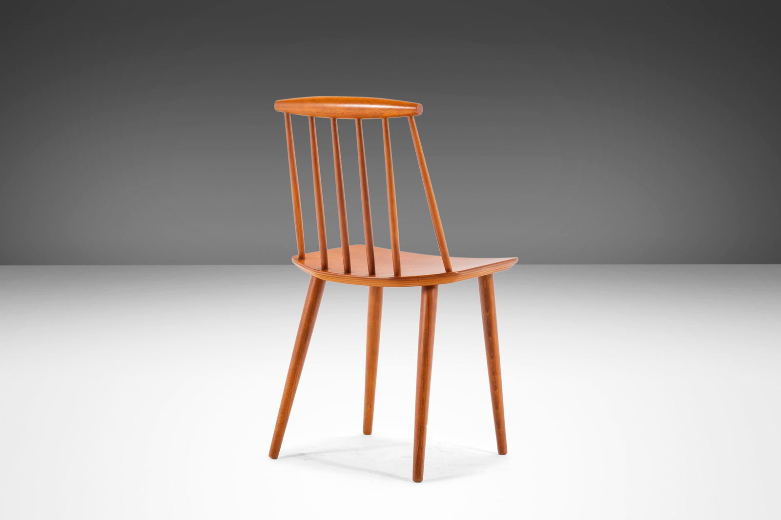 Mid-Century Modern Teak J 77 'Farmhouse' Chair by Folke Palsson: Mid-Century Modern Teak J 77 'Farmhouse' Chair by Folke Palsson The Model J 77 'Farmhouse' Chair, designed by Folke Palsson for FDB Mobelfabrik, embodies the perfect blend of rustic farmhouse charm an