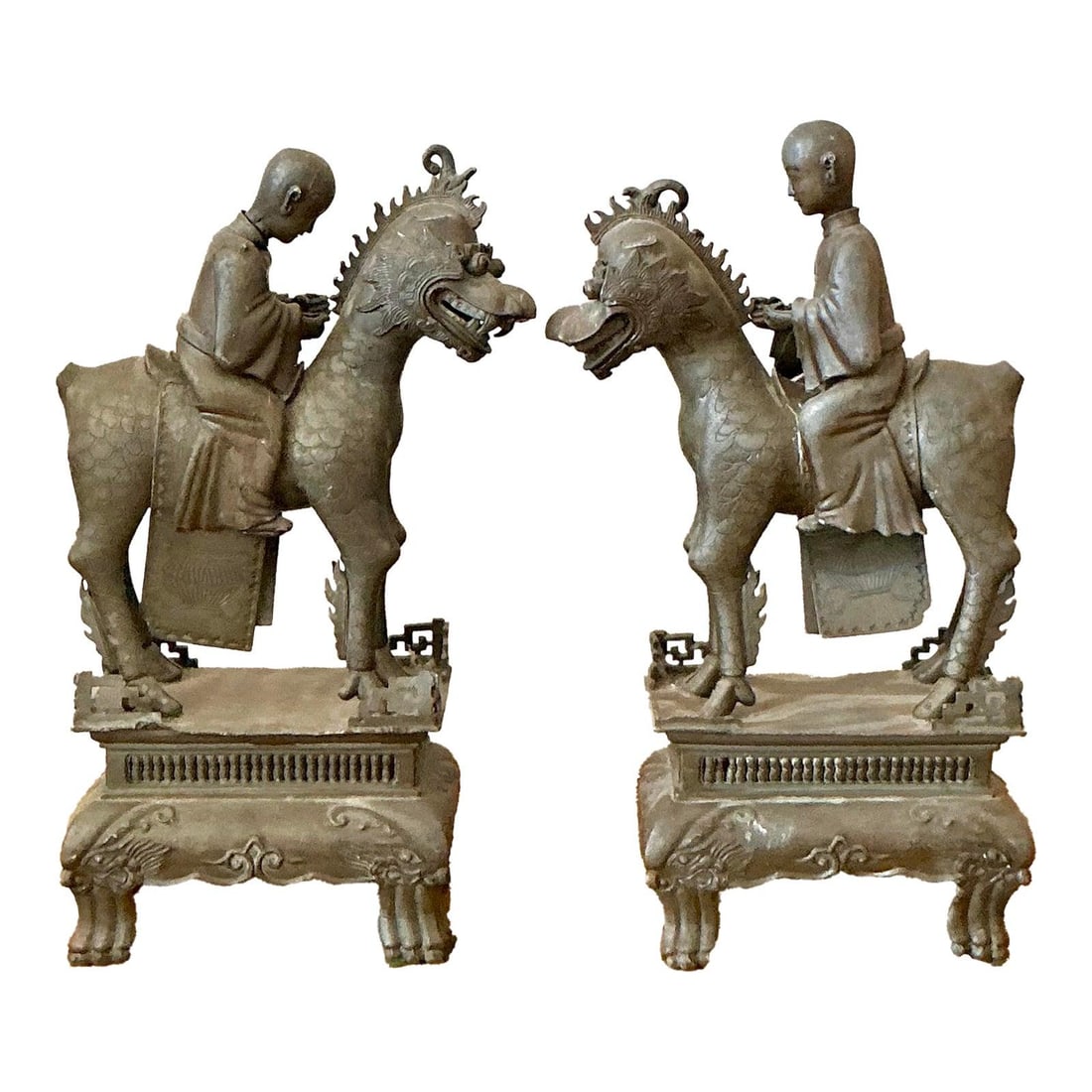 Vintage Asian Pewter Immortal Couple Statues Set of 2: Vintage Asian Pewter Immortal Couple Statues Set of 2 This captivating pair of vintage Asian statues depicts serene immortals or scholars riding atop powerful, mythical beasts, likely the auspicious Q