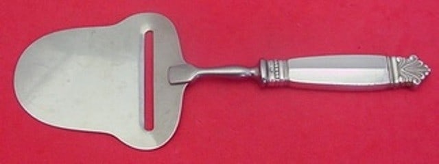 Georg Jensen Acanthus Sterling Silver Cheese Plane 8.5": Georg Jensen Acanthus Sterling Silver Cheese Plane 8.5" Experience the elegance of the Acanthus cheese plane by Georg Jensen, crafted from high-quality sterling silver. This exquisite piece dates back