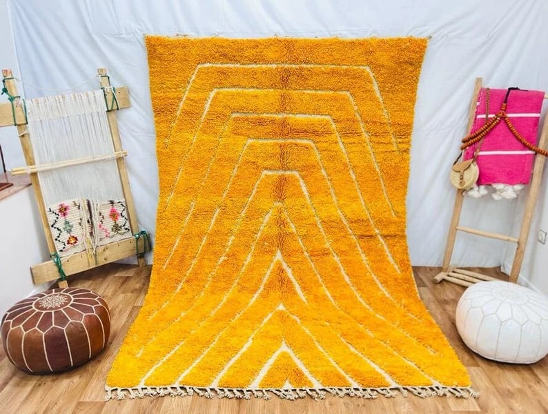 Authentic 8 x 5 Feet Handwoven Engraved Wool Rug Morocco: Authentic 8 x 5 Feet Handwoven Engraved Wool Rug Morocco This stunning engraved wool rug is an authentic piece, handwoven in the Atlas Mountains by skilled local Berber women weavers. Utilizing tradit