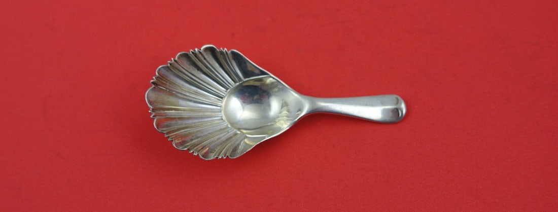 English Estate Sterling Silver Tea Caddy Spoon Shell Bowl 3 3/8": English Estate Sterling Silver Tea Caddy Spoon Shell Bowl 3 3/8" This exquisite English Estate Sterling Silver Tea Caddy Spoon features a charming shell bowl design. Crafted in Sheffield between 1900