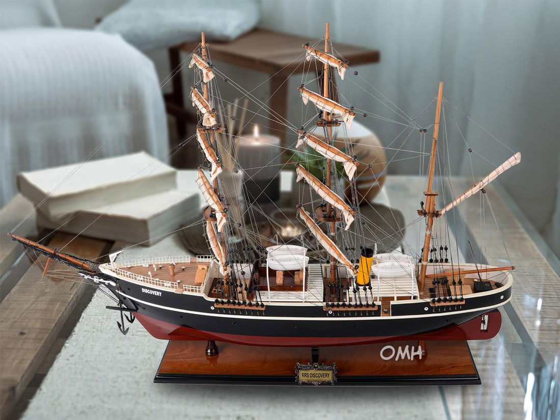 Handmade Nautical Style RRS Discovery Ship Model in Black: Handmade Nautical Style RRS Discovery Ship Model in Black This elegant RRS Discovery replica is a stunning model that captures the essence of traditional nautical design. Handmade from a combination o