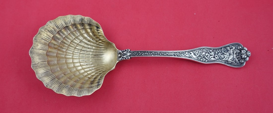 Tiffany & Co Olympian Sterling Silver Berry Spoon Clam Shell 8.75 inch: Tiffany & Co Olympian Sterling Silver Berry Spoon Clam Shell 8.75 inch Discover the exquisite Olympian Berry Spoon by Tiffany & Co., crafted from high-quality sterling silver. This elegant serving spo