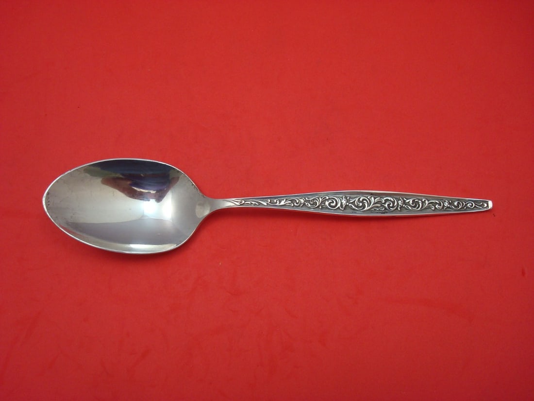 Reed & Barton Renaissance Scroll Sterling Silver Serving Spoon 8.5": Reed & Barton Renaissance Scroll Sterling Silver Serving Spoon 8.5" This exquisite serving spoon features the Renaissance Scroll pattern by Reed & Barton, crafted from high-quality sterling silver. Me