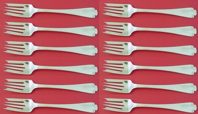 Tiffany & Co Flemish Sterling Silver Salad Forks Set of 12 pcs 6 3/4": Tiffany & Co Flemish Sterling Silver Salad Forks Set of 12 pcs 6 3/4" Elevate your dining experience with this exquisite set of 12 salad forks from the renowned Tiffany & Co., featuring the elegant Fl