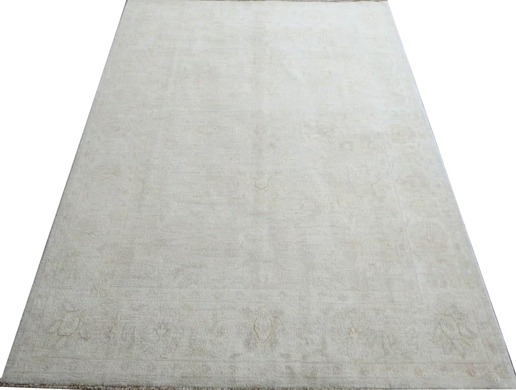 5' x 7' Ivory Chobi Peshawar Hand-Knotted Wool Area Rug: 5' x 7' Ivory Chobi Peshawar Hand-Knotted Wool Area Rug Free continental US Shipping Enhance your home with the 5' x 7' Chobi Peshawar Rug, a stunning blend of traditional artistry and contemporary el