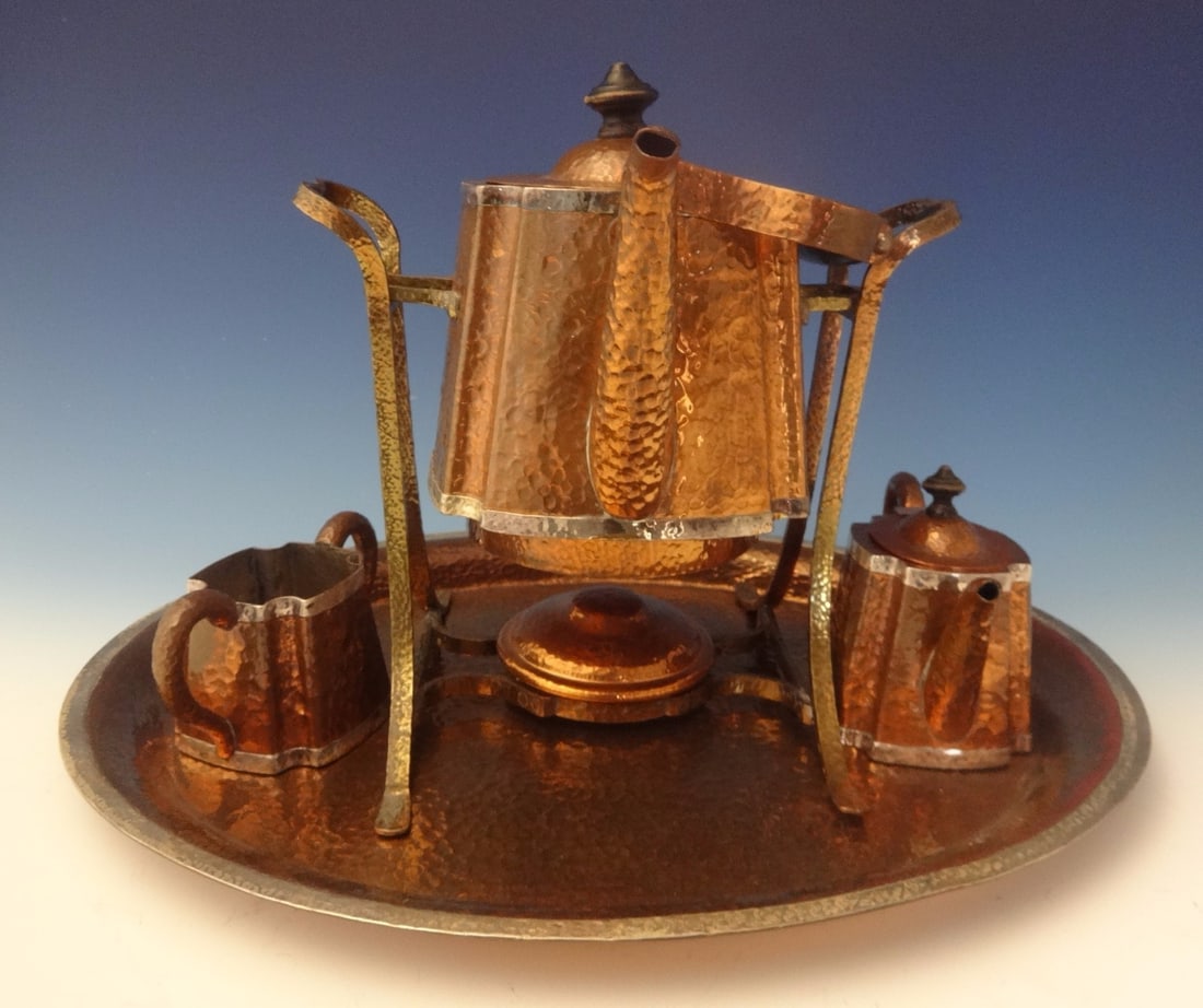 Joseph Heinrich Arts & Crafts Copper Tea Set 4pc Handmade: Joseph Heinrich Arts & Crafts Copper Tea Set 4pc Handmade This stunning Arts & Crafts 4-piece tea set, handcrafted by Joseph Heinrichs, features exquisite hand-hammered copper complemented by applied