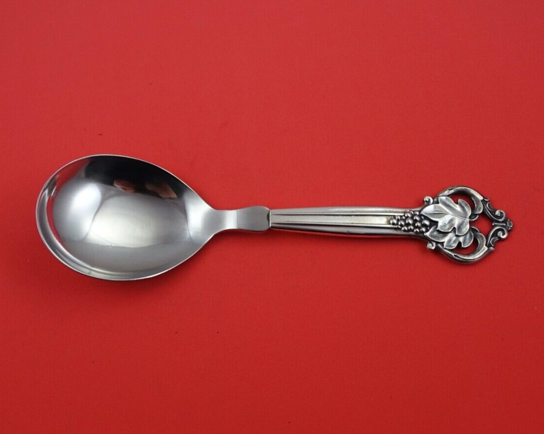 Cohr Sterling Silver Grape Vine Berry Spoon 9 inch: Cohr Sterling Silver Grape Vine Berry Spoon 9 inch This exquisite berry spoon is crafted from sterling silver by Cohr, featuring a charming grape vine design. Measuring 9 inches in length, it showcase