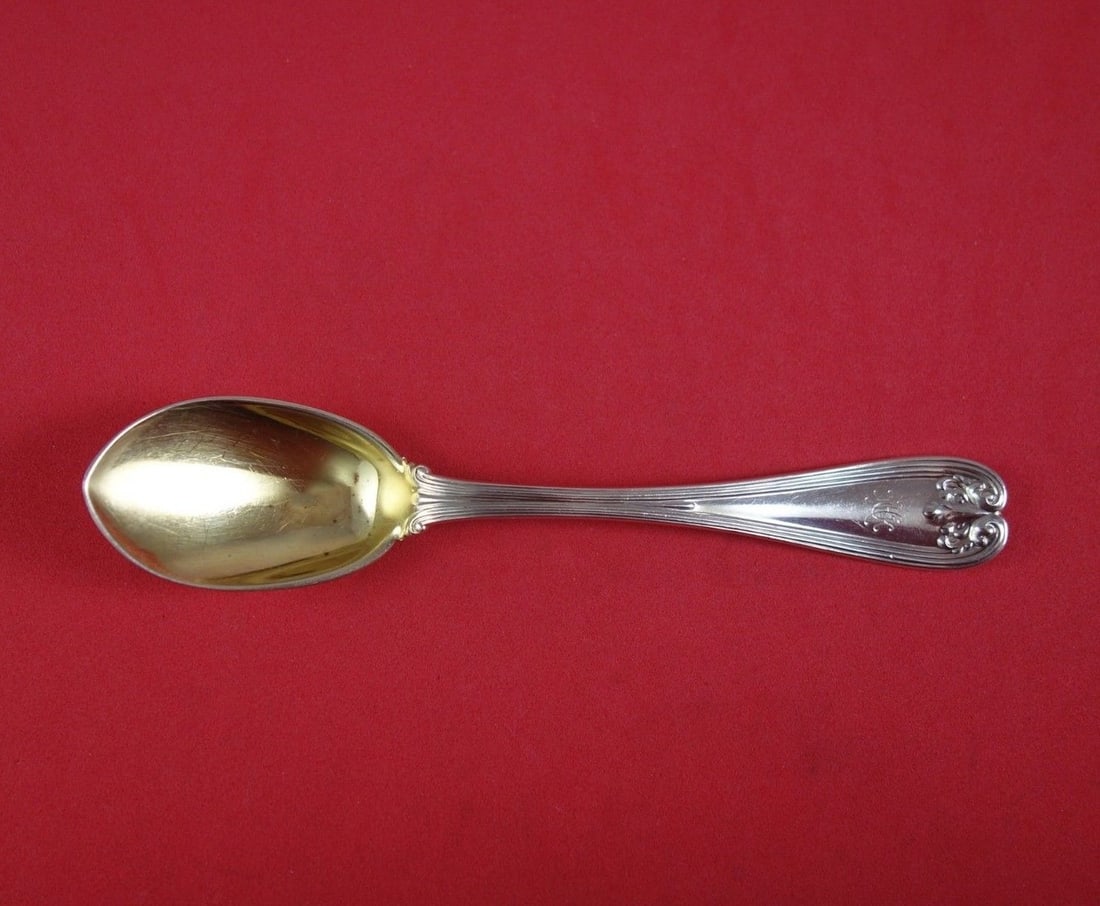 Tiffany & Co Colonial Sterling Silver Gold Washed Ice Cream Spoon 5 3/4": Tiffany & Co Colonial Sterling Silver Gold Washed Ice Cream Spoon 5 3/4" This exquisite ice cream spoon from Tiffany & Co. showcases the elegant Colonial pattern, a true classic from the renowned bran