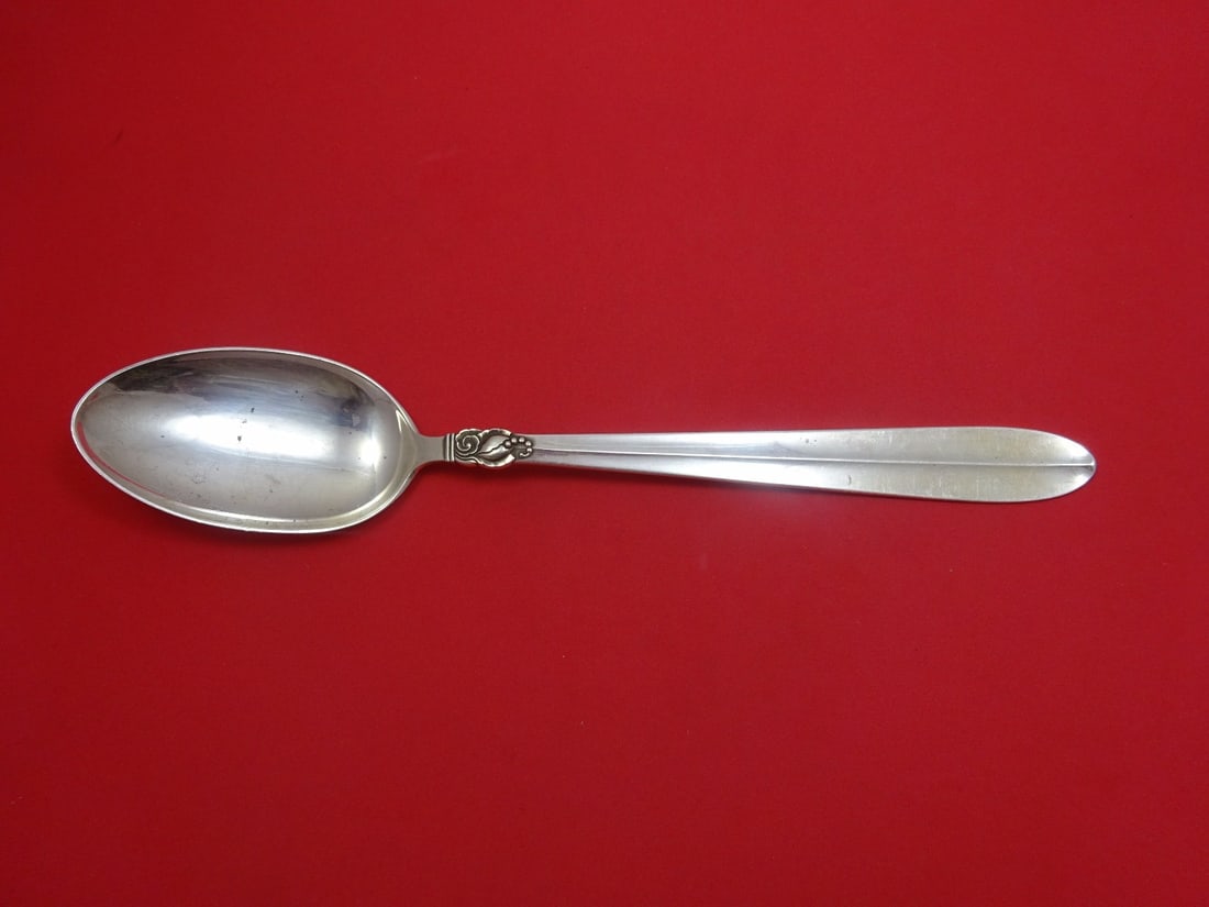 Frigast Princess Fuchsia Sterling Silver Serving Spoon 11 3/4": Frigast Princess Fuchsia Sterling Silver Serving Spoon 11 3/4" This stunning serving spoon features the elegant Princess Fuchsia pattern by Frigast. Crafted from high-quality sterling silver, this stu