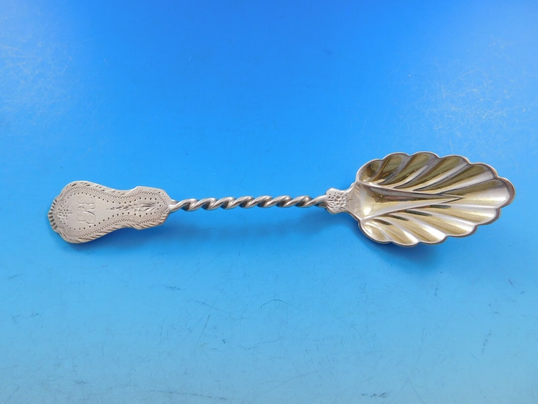Towle Sterling Silver Brite Cut Ice Cream Spoon 6" Twisted Design: Towle Sterling Silver Brite Cut Ice Cream Spoon 6" Twisted Design This exquisite ice cream spoon features a twisted design with a shell-shaped bowl, showcasing the intricate Brite-cut pattern. Crafted
