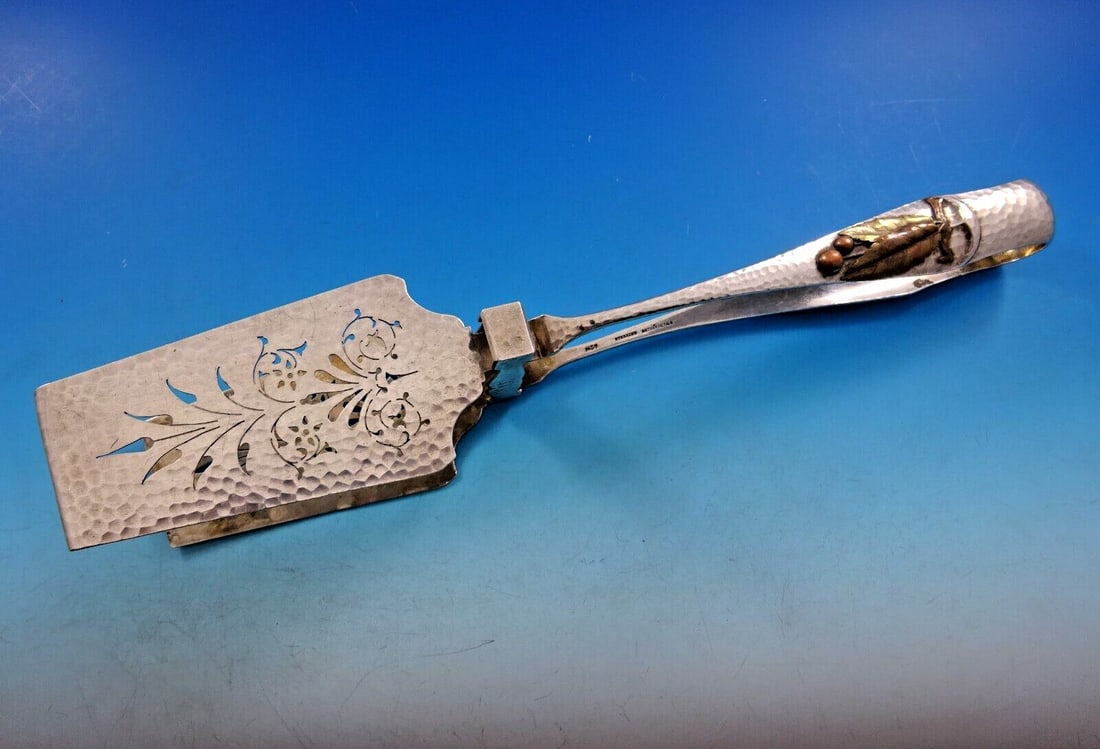 Gorham Applied Metals Sterling Silver Asparagus Serving Tong 11 5/8": Gorham Applied Metals Sterling Silver Asparagus Serving Tong 11 5/8" This exquisite asparagus serving tong from Gorham showcases the brand's hallmark craftsmanship. Created in the Applied Metals patte