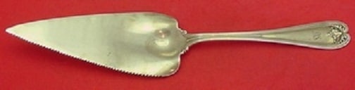 Tiffany & Co Colonial Sterling Silver Pie Server 11 1/4 Serrated Blade: Tiffany & Co Colonial Sterling Silver Pie Server 11 1/4 Serrated Blade This exquisite pie server from Tiffany & Co. features a serrated blade and is crafted from high-quality sterling silver. Designed