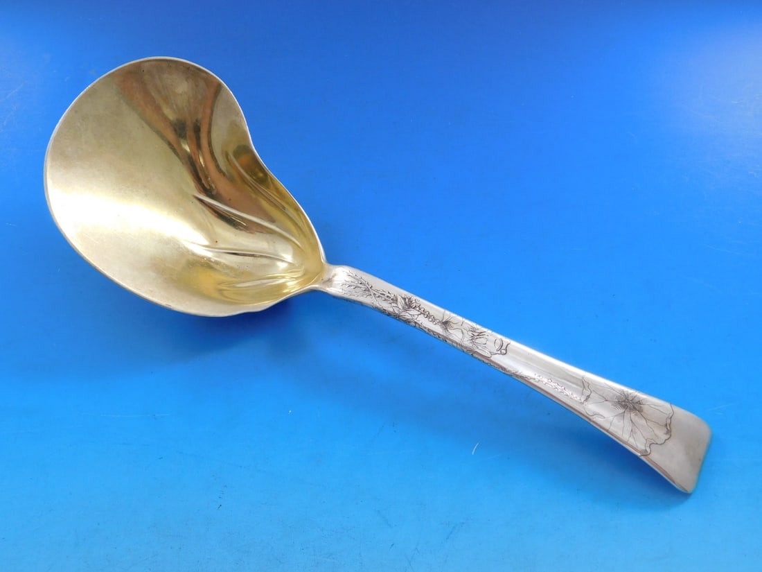 Tiffany Sterling Silver Berry Spoon Lap Over Edge Acid Etched 9 5/8" Conch Bowl: Tiffany Sterling Silver Berry Spoon Lap Over Edge Acid Etched 9 5/8" Conch Bowl This exquisite serving spoon, crafted by Tiffany & Co., features the elegant Lap Over Edge Acid Etched pattern. Made fro