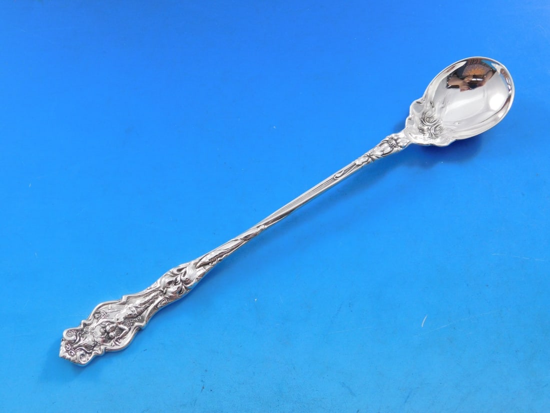 Wallace Irian Sterling Silver Long Olive Spoon 7 7/8": Wallace Irian Sterling Silver Long Olive Spoon 7 7/8" Presenting the stunning Irian Olive Spoon by Wallace, crafted from high-quality sterling silver. This elegant serving spoon measures 7 7/8" and fe