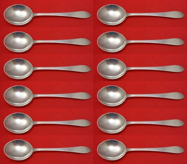 Tiffany & Co Faneuil Sterling Silver Soup Spoons Set of 12: Tiffany & Co Faneuil Sterling Silver Soup Spoons Set of 12 Enhance your dining experience with this exquisite set of 12 Faneuil gumbo soup spoons by Tiffany & Co. Crafted from high-quality sterling si