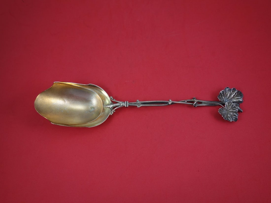 Wood and Hughes Sterling Silver Cracker Scoop 11.5" Leaf Handle: Wood and Hughes Sterling Silver Cracker Scoop 11.5" Leaf Handle This exquisite cracker scoop from Wood and Hughes showcases a stunning gold-washed finish and features a beautifully designed handle wit