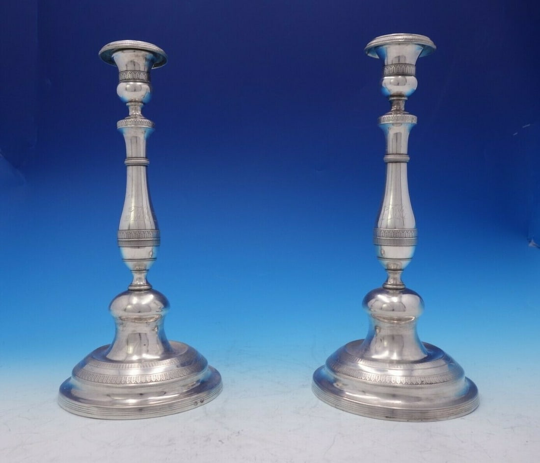 Pair of Handwrought Portuguese .800-.850 Silver Candlesticks: Pair of Handwrought Portuguese .800-.850 Silver Candlesticks This exquisite pair of Portuguese candlesticks is crafted from .800-.850 silver and features a beautiful handwrought design. Each candlesti