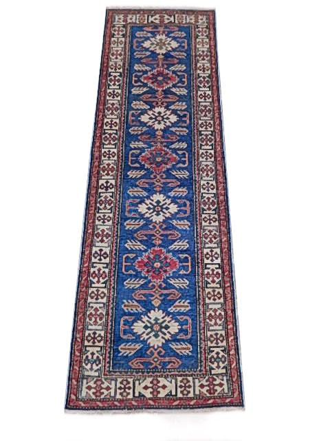 2.8 x 8.3 Blue Super Kazak Hand-knotted Area Rug from Pakistan: 2.8 x 8.3 Blue Super Kazak Hand-knotted Area Rug from Pakistan Free continental US Shipping Enhance your space with the luxurious feel of this 2.8 x 8.3 Blue Super Kazak Traditional Hand-knotted Rug.