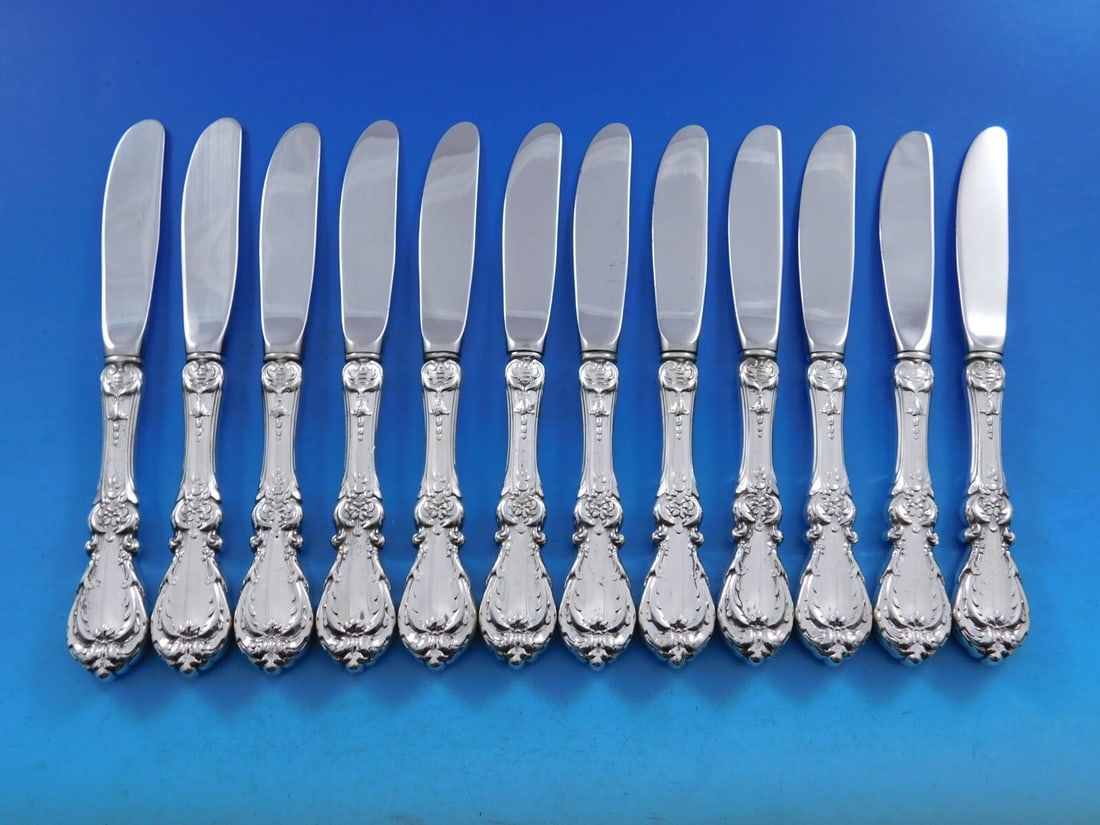 Reed & Barton Burgundy Sterling Silver Butter Spreaders Set of 12: Reed & Barton Burgundy Sterling Silver Butter Spreaders Set of 12 Elevate your dining experience with this exquisite set of 12 butter spreaders from Reed & Barton's Burgundy pattern. Crafted from high