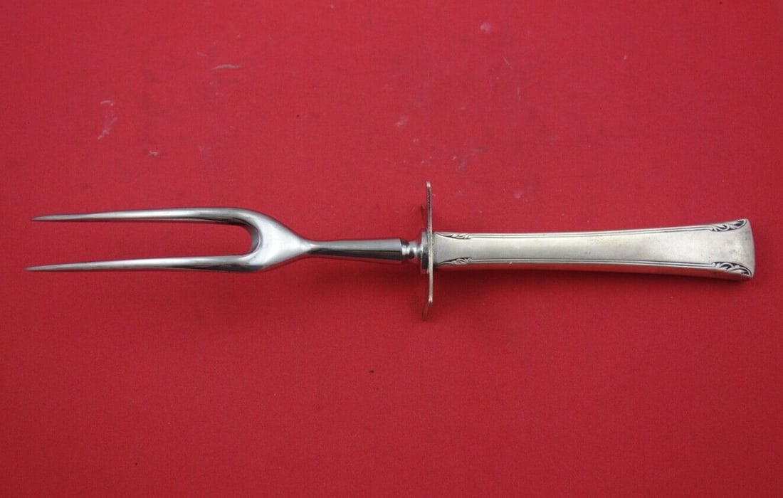 International Silver Serenity Sterling Silver Carving Fork 10 3/4": International Silver Serenity Sterling Silver Carving Fork 10 3/4" This exquisite roast carving fork from the Serenity pattern by International Sterling Silver is a beautiful addition to any table