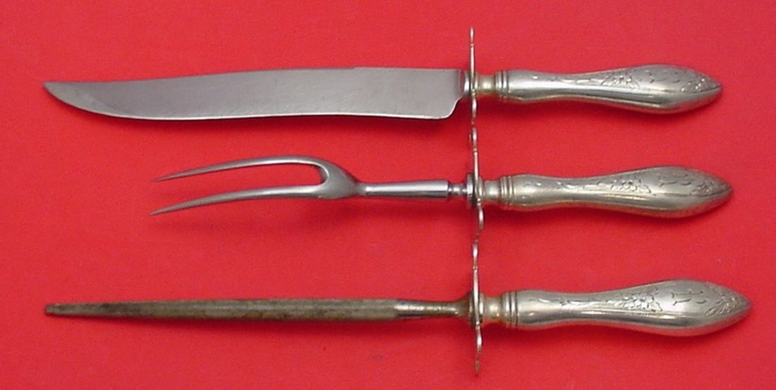 Kirk Primrose Sterling Silver 3pc Roast Carving Set Puffy Handles 11 3/4": Kirk Primrose Sterling Silver 3pc Roast Carving Set Puffy Handles 11 3/4" This exquisite three-piece roast carving set in the Primrose pattern by Kirk showcases stunning puffy handles crafted from ste