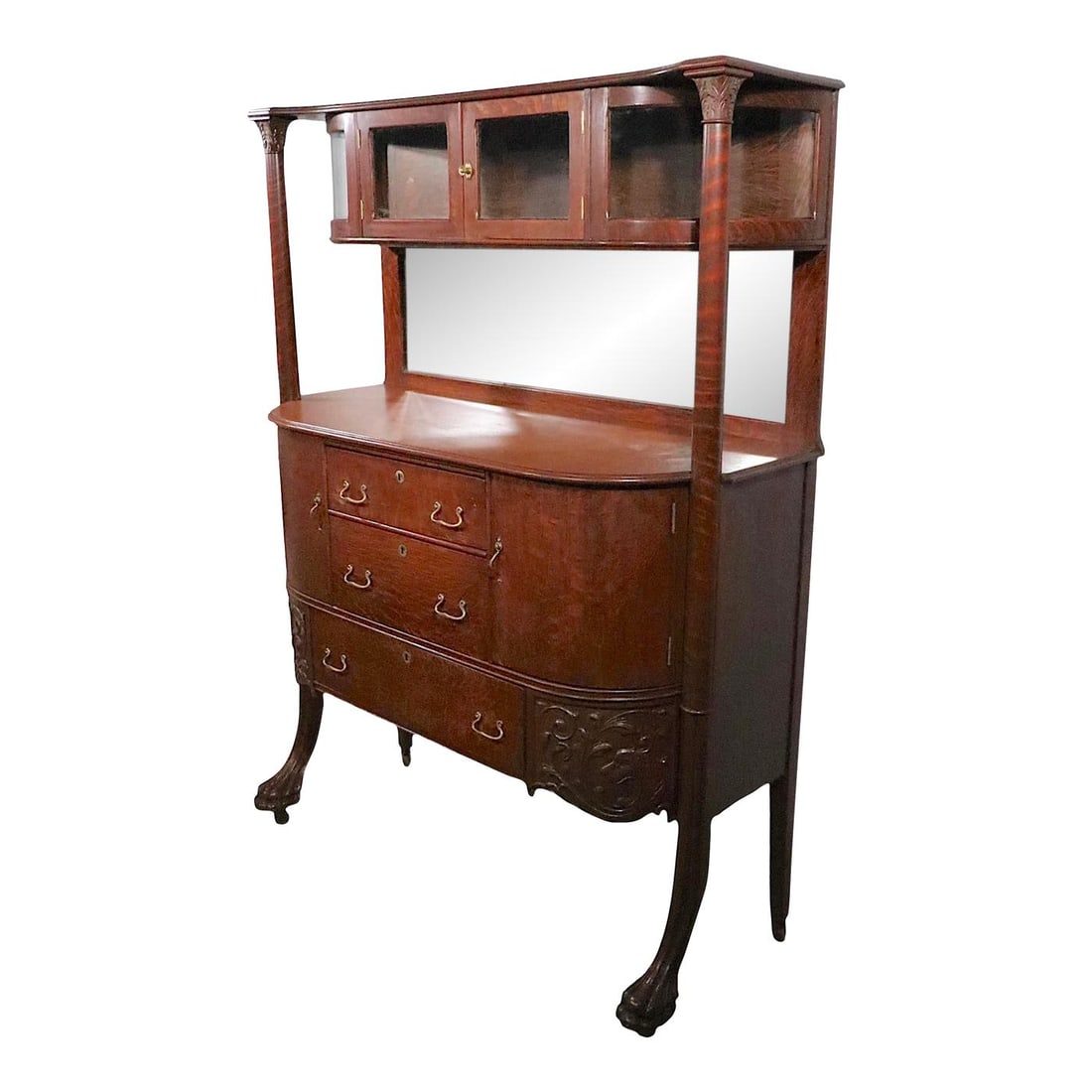 19th Century Victorian Oak Sideboard Curved Glass Showcase Paw Feet: 19th Century Victorian Oak Sideboard Curved Glass Showcase Paw Feet This exquisite 19th Century Victorian oak sideboard combines timeless elegance with functional design. Featuring a stunning curved g