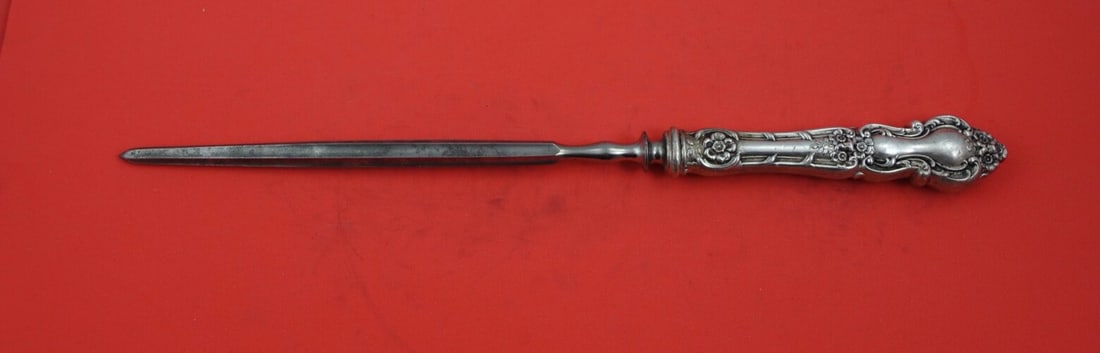 Wallace Meadow Rose Sterling Silver Roast Carving Fork 13": Wallace Meadow Rose Sterling Silver Roast Carving Fork 13" This elegant serving fork is a part of the Meadow Rose pattern by Wallace, crafted from sterling silver. Featuring a hollow handle with a dur