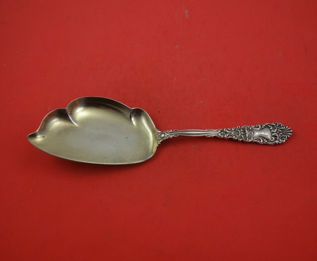 Dominick & Haff Renaissance Sterling Silver Ice Cream Server 10 3/8": Dominick & Haff Renaissance Sterling Silver Ice Cream Server 10 3/8" This exquisite ice cream server from the Renaissance pattern, crafted by Dominick & Haff, showcases the timeless elegance of sterli