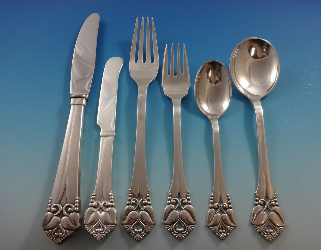 74-Piece Greta Sterling Silver Flatware Set by Mogensen: 74-Piece Greta Sterling Silver Flatware Set by Mogensen Discover the exquisite Greta flatware set designed by renowned Danish silversmith Orla Vagn Mogensen. This impressive collection features 74 pie