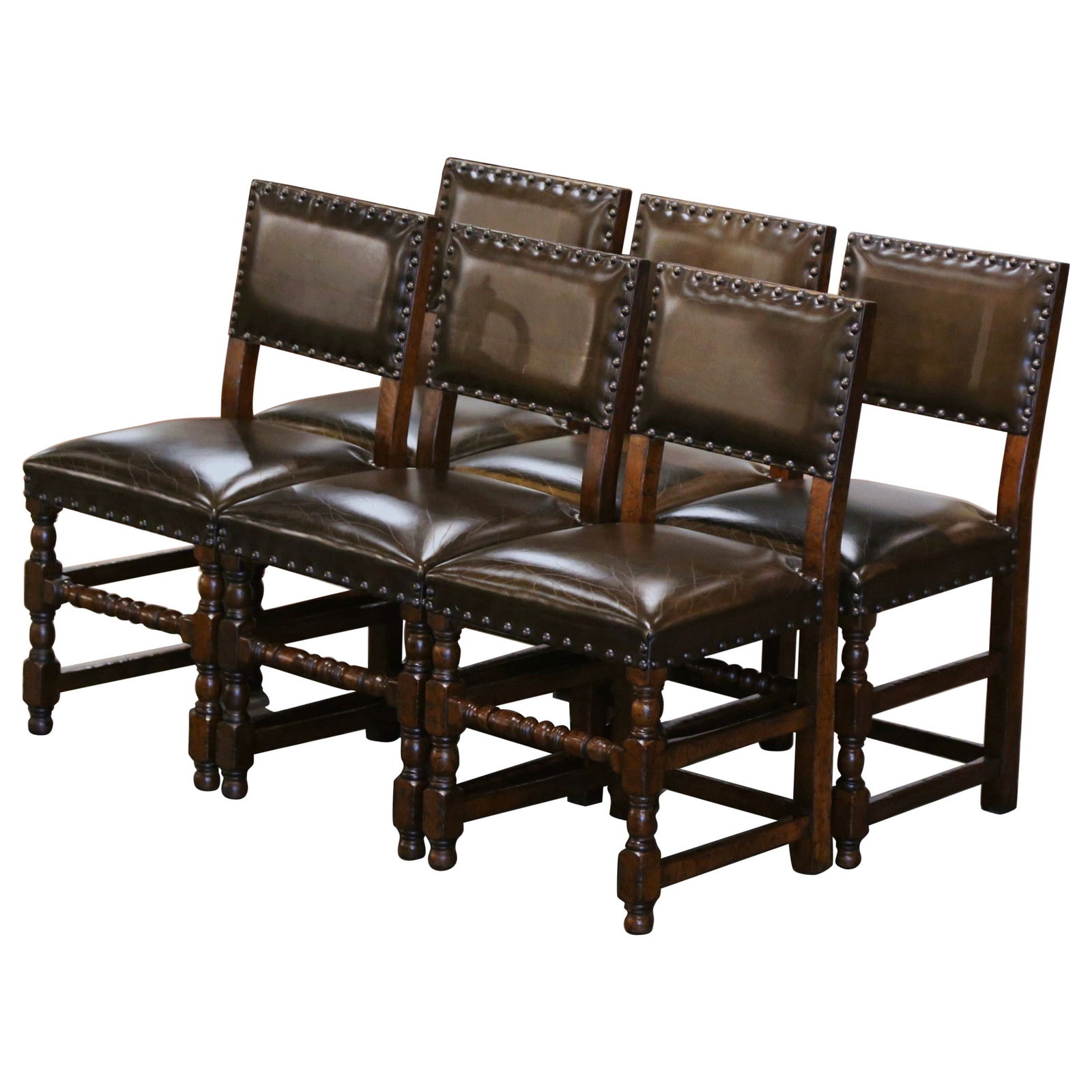 Set of Six Louis XIII French Oak and Leather Chairs 1880: Set of Six Louis XIII French Oak and Leather Chairs 1880 This elegant set of six 19th Century French chairs showcases the timeless Louis XIII style. Crafted in southern France around 1880, these chair